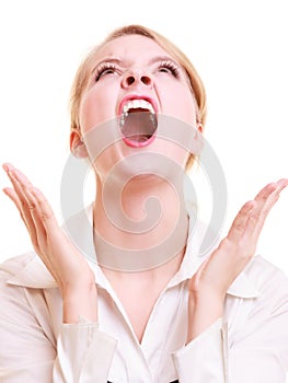 Angry businesswoman furious woman screaming