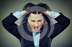 Angry businesswoman shouting