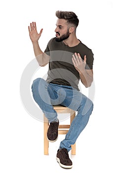 Angry casual man gesturing and arguing