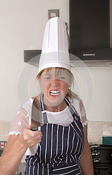 Angry chef holding a large knife