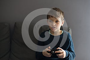 Angry child playing video games