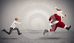 Angry child with Santa Claus