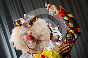 Angry clown with guitar