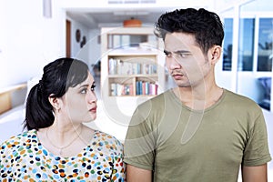 Angry couple close-up at home