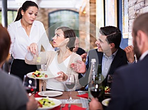 Angry couple conflict with waitress