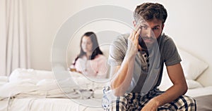 Angry couple, divorce and fight on bed in disagreement, conflict or toxic relationship at home. Upset and frustrated man