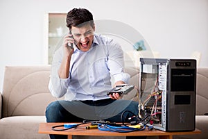 The angry customer trying to repair computer with phone support