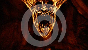 Angry demon face screams in fire. Orange color. photo