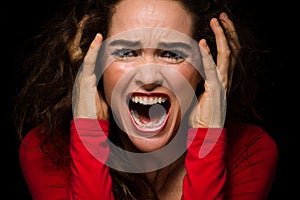 Angry, desperate woman screaming