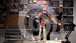 Angry detective or investigator crumpled papers in office, business fail, business, people, stress, emotions and fail