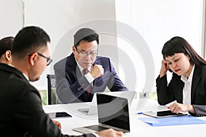 Angry dissatisfied Senior business man asia Meeting Communication Discussion Working Office serious,pointing at terms failed to p
