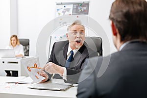 Angry employer expressing fierce in the office
