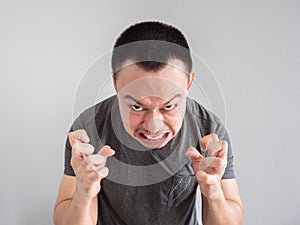 Angry face of asian man portrait.