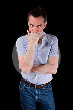Angry Frowning Man Glaring over Hand on Chin photo