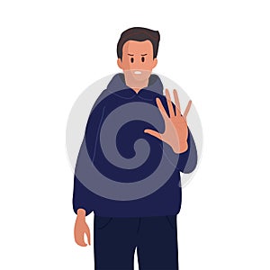 Angry frustrated man standing and expressing refusal position. Gesture of disagreement. Young Caucasian man standing photo