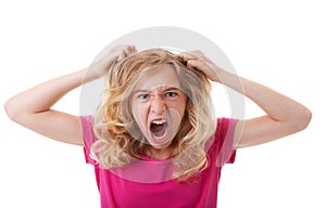 Angry girl is pulling her hair