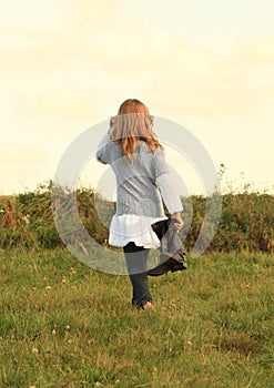 Angry girl walking barefoot