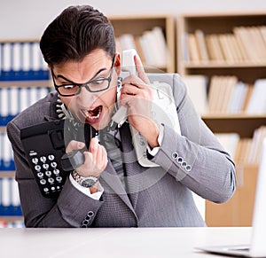 Angry helpdesk operator yelling in office