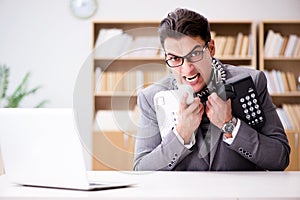 The angry helpdesk operator yelling in office