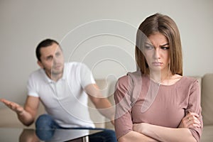 Angry husband mad at wife, unhappy woman frustrated, family conf