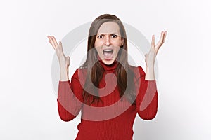 Angry irritated young brunette woman girl in casual red clothes posing isolated on white background studio portrait