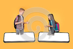 Angry Kids Having Quarrel Standing On Smartphones Screens, Orange Background