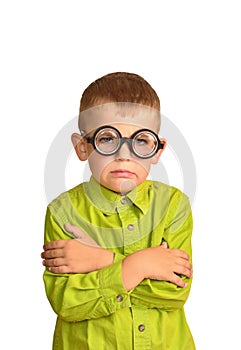 Angry little boy in funny glasses