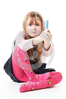 Angry little girl with chalk