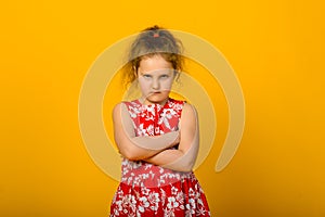 Angry little girl isolated on a over white background