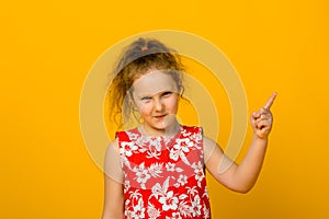 Angry little girl isolated on a over white background
