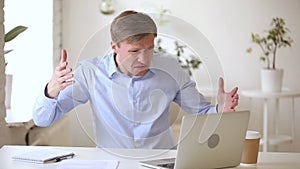 Angry mad businessman stressed crazy about computer online problem