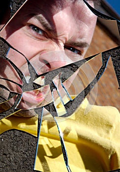 Angry Man in Broken Mirror