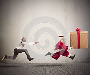 Angry man chasing Santa Claus