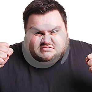 Angry man fighting with clenched fists, isolated