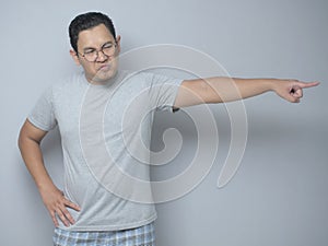 Angry Man Giving Warn, Pointing to the Side