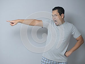 Angry Man Giving Warn, Pointing to the Side
