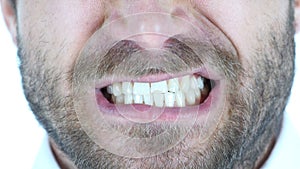 Angry Man Grinding Teeth, Close Up photo