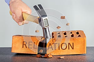 Angry man with hammer break relation