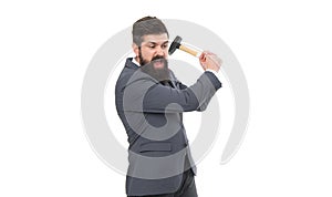 Angry man holding hammer studio. Professional man shouting in anger. Business problem