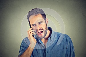 Angry man, mad worker, off employee shouting while on phone