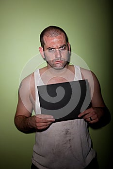 Angry man in mugshot