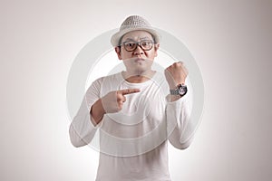 Angry man Pointing at Wristwatch