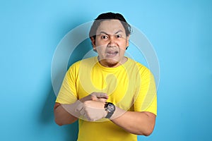 Angry man Pointing at Wristwatch