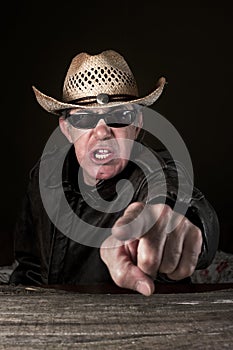 Angry man pointing and yelling