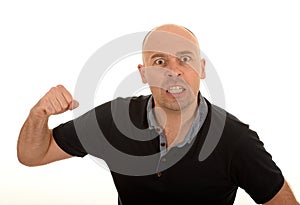 Angry man with raised fist