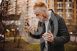 Angry man screaming on phone