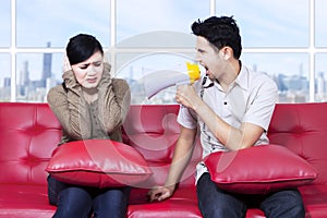 Angry man shouting against his girlfriend