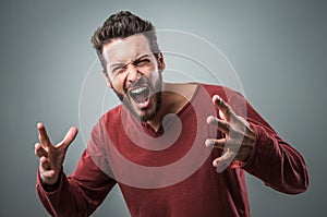 Angry man shouting out loud photo