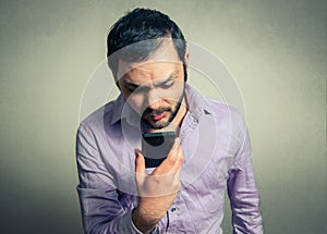 Angry man shouting on phone