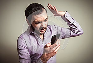 Angry man shouting on phone